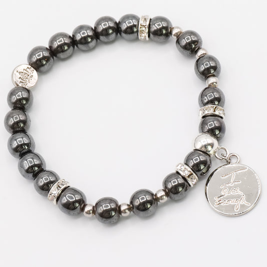 a bracelet with a silver charm