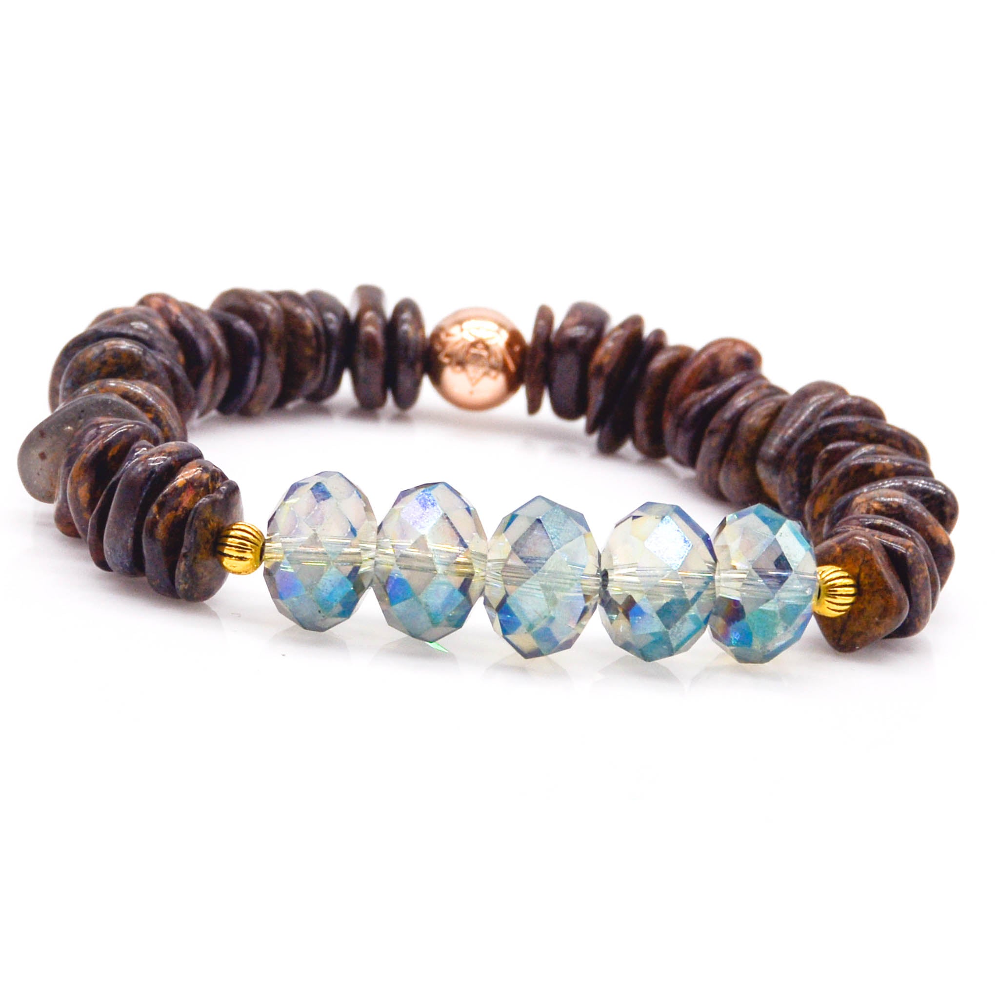 a bronzite bracelet with a blue bead on it